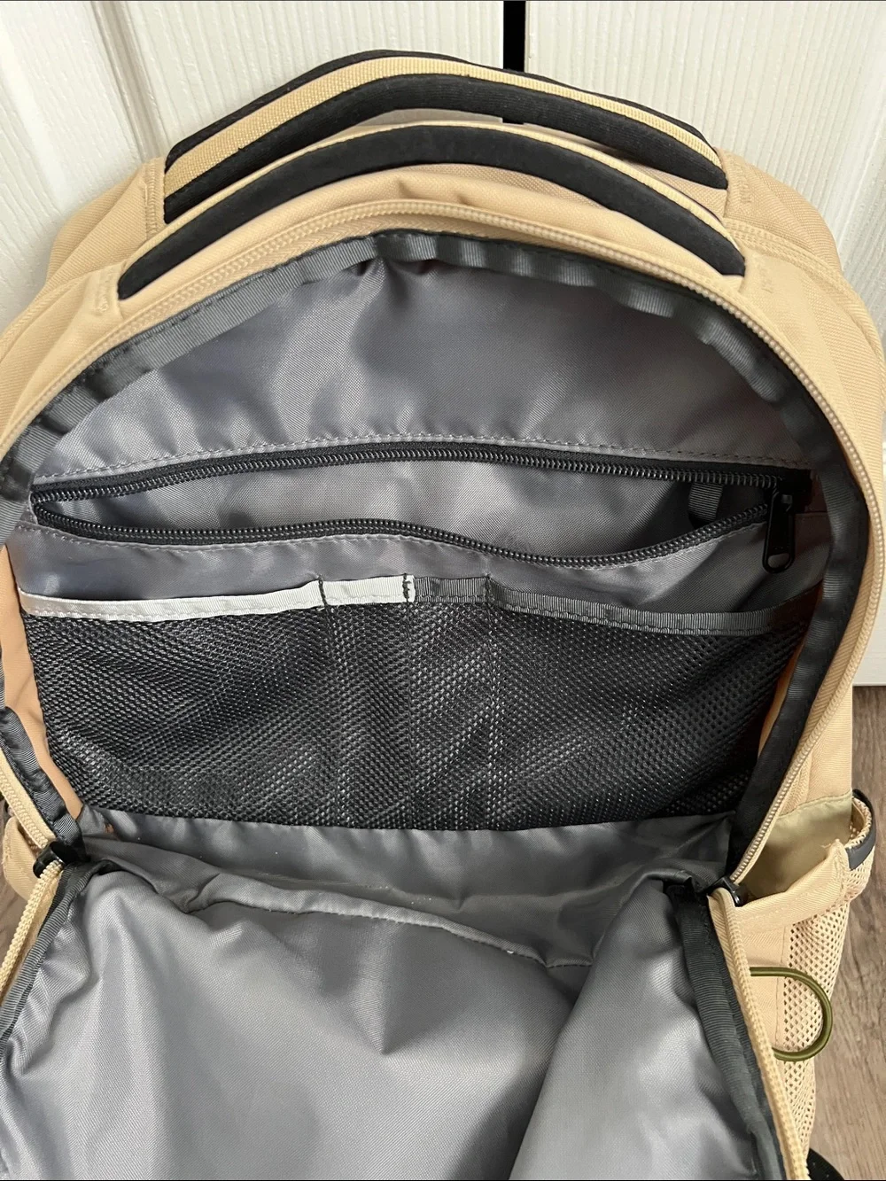The North Face Jester Backpack in Beige with Olive Bungee